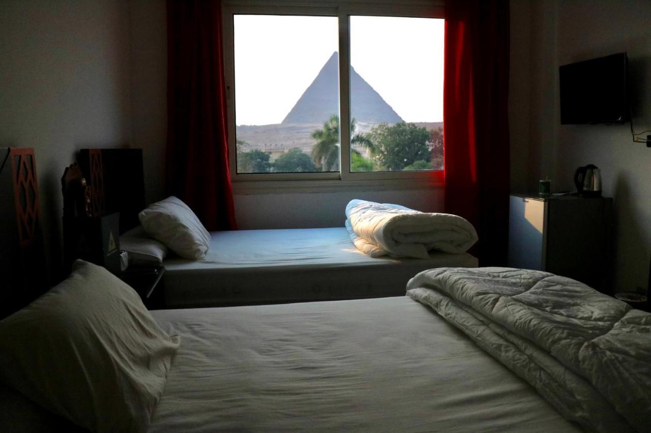 Sahara Pyramids Inn Кайро Екстериор снимка